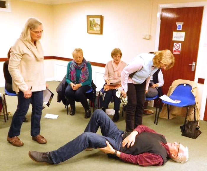 Volunteers receiving First Aid training