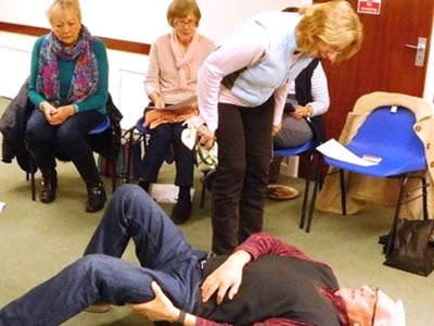 Volunteers receiving First Aid training